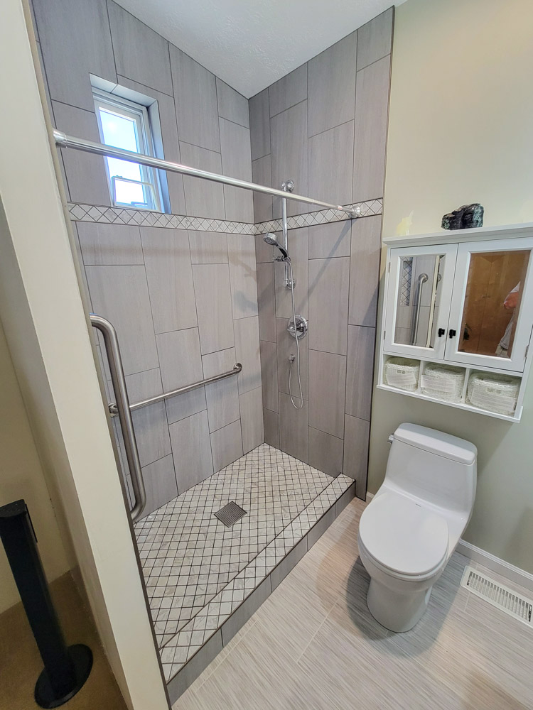 A bathroom renovation, improving the shower area with tile installation